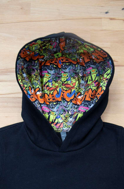 UNISEX KIDS CONTRAST PATTERNED HOODED SWEATSHIRT - Black/Skate Graffiti - colorimageurl