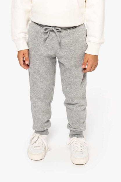 KIDS’ JOGGING TROUSERS - Black - modelimageurl