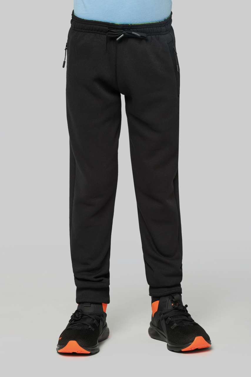 KID'S MULTISPORT JOGGING PANTS WITH POCKETS - Black - modelimageurl