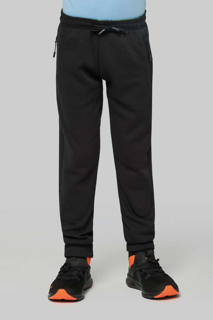 KID'S MULTISPORT JOGGING PANTS WITH POCKETS - Black - modelimageurl