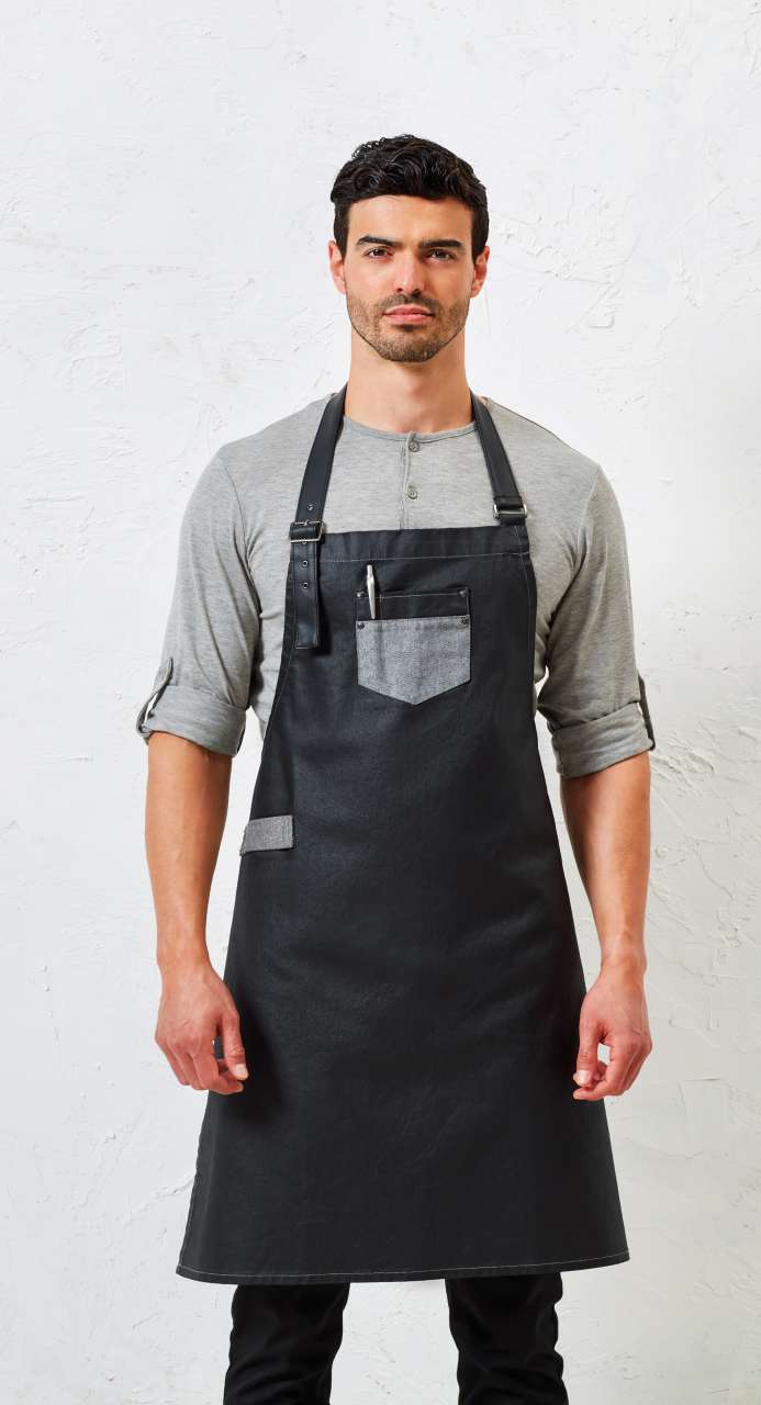 'DIVISION' WAXED LOOK DENIM BIB APRON WITH FAUX LEATHER - Black Denim - Model
