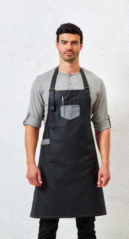 'DIVISION' WAXED LOOK DENIM BIB APRON WITH FAUX LEATHER - Black Denim - Model